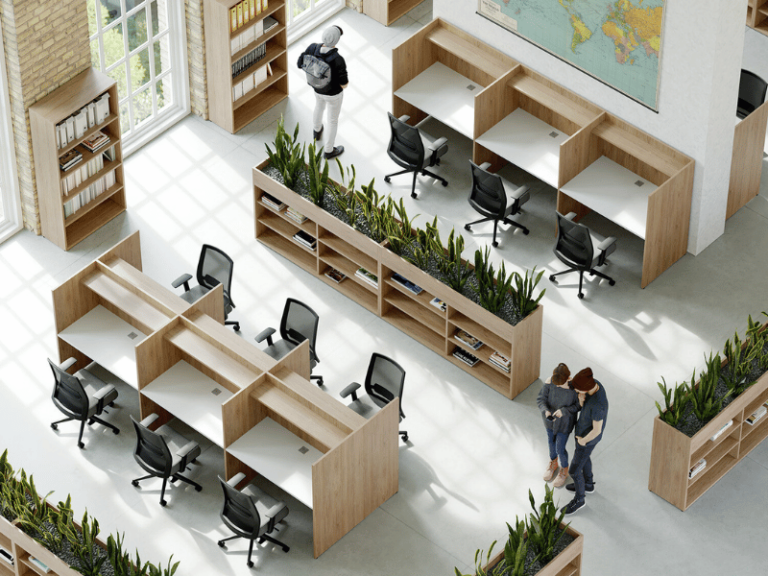 Open plan design with workstations that have privacy screens and spaces that are divided by bookshelf planters.