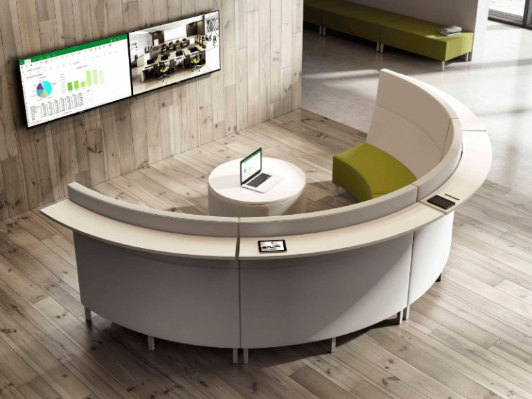 A half circle furniture piece featuring lounge seating on one side and a curved standing height table on the back side.