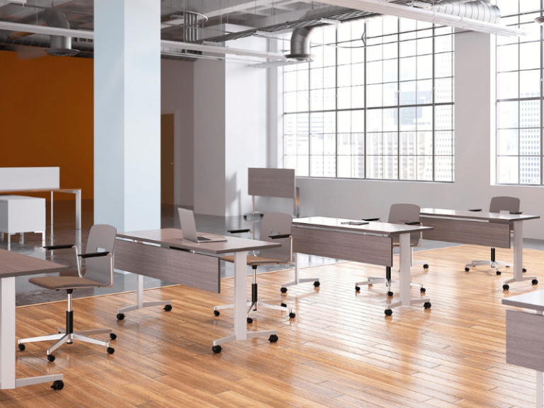 Neutral tables and chairs on casters are featured in this industrial education design.