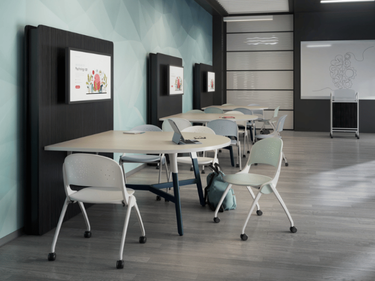 Three media walls with four chairs each in an education environment.