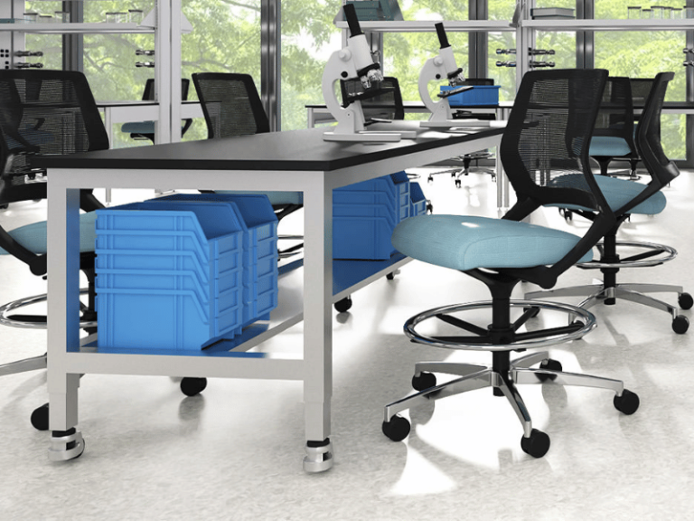 Blue upholstered task chair in a laboratory setting.